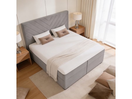 A continental bed with a VICTORIA mattress and bedding storage compartments